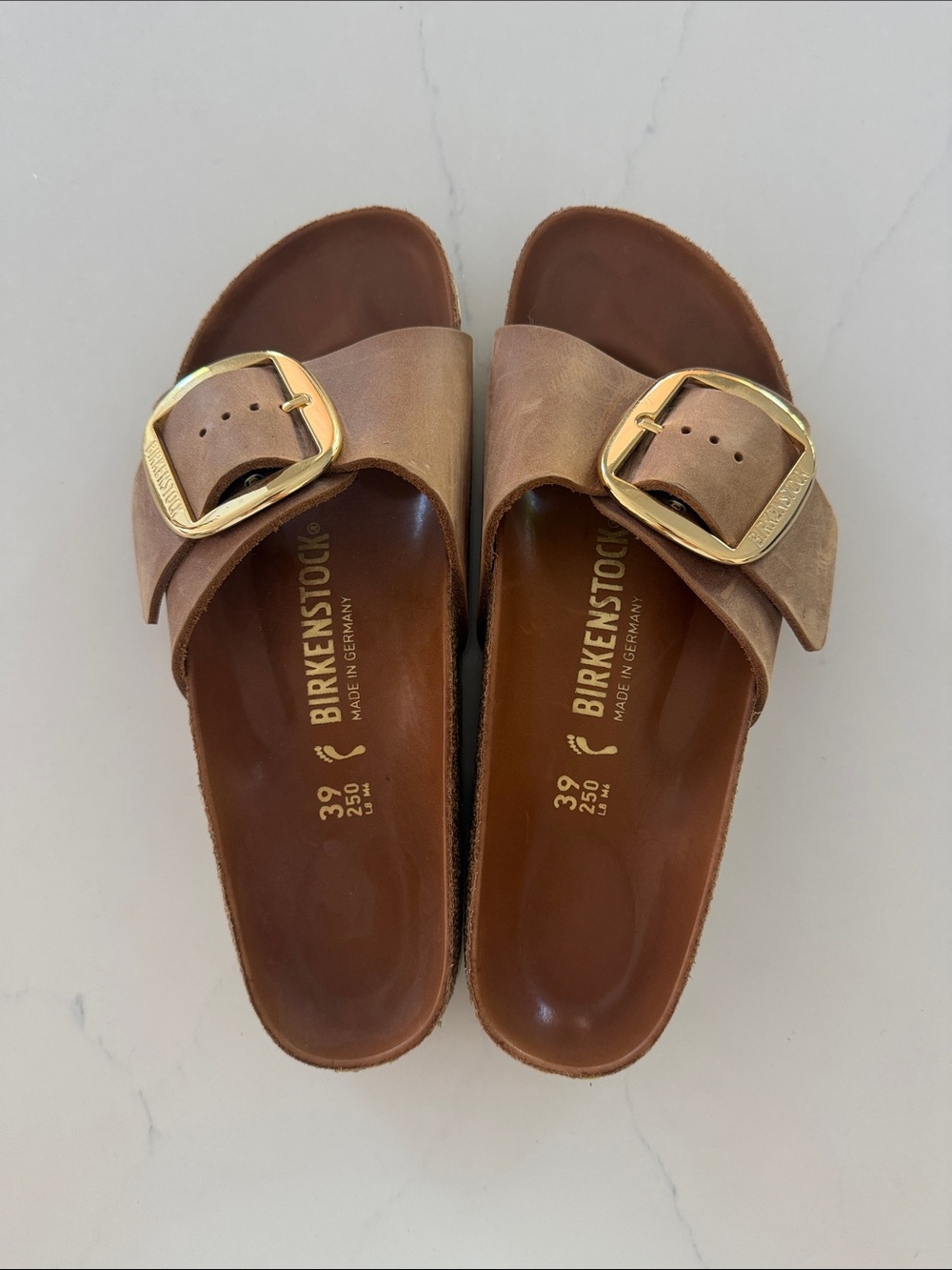 Birkenstock Women's Single Strap Slide Sandals in Brown with Gold Buckle